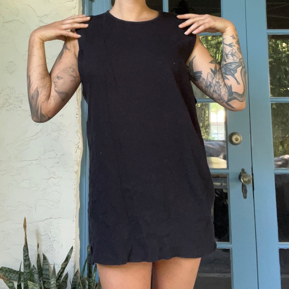 Oversized black muscle tank top, I love this but it’s a bit too oversized lol